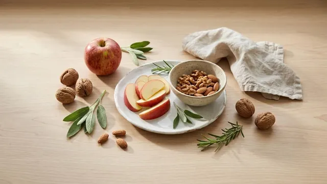 Manzana con un puñado de nueces